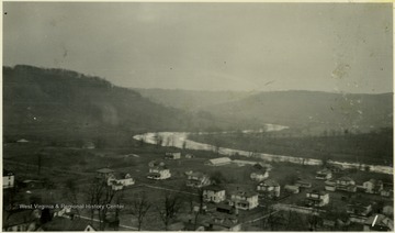 Elevated view of the river meandering through the town.