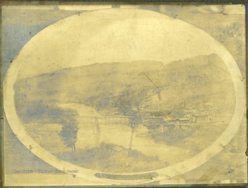 Probably a photograph of a sketch from an elevated view which includes part of Grafton and a bridge crossing the river.
