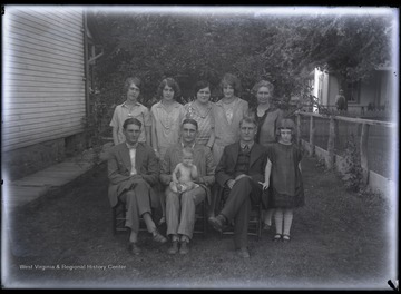 Unidentified members of the Fansler family pose for a group portrait.