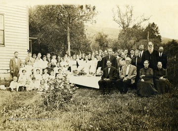 Ira Summers, standing back row, second from left, under "X", is only family member identified in the group portrait of his wife's family.