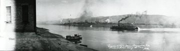 Steamboat, "Queen City" on the Ohio River passing the Tube Works.