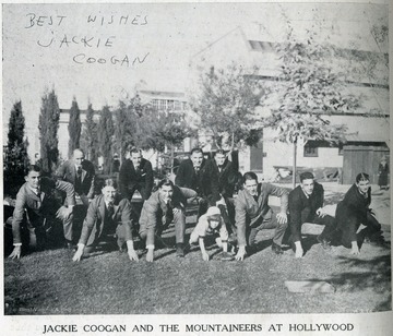 West Virginia University's undefeated football team travelled to the west coast to play Gonzaga in a post season game. Jackie Coogan, a famous child-movie actor of the period, posed with the team for this photograph and autographed the original print. WVU beat Gonzaga 21 to 14.