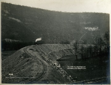 Photograph taken during the construction of the railroad. Other information included: " 1 Div.Mile 2. Sta. 950."