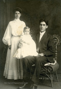 Pictured holding their son John Knapp.