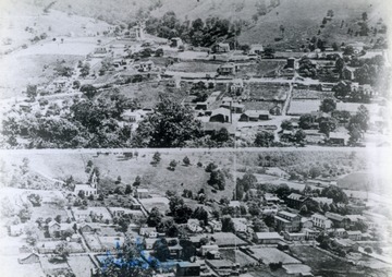 Postcard photograph of an aerial view of the town. 