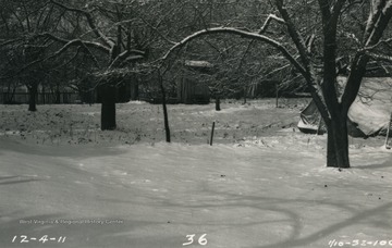 Outhouse pictured in back/middle. Group encountered harsh weather conditions while marking boundary.