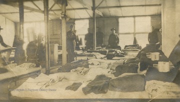 Members of the 80th Divsion U.S. Army inside their sleeping area at Camp Lee, Virginia during basic training. During the Meuse Argonne campaign, the 80th Division was the only one that saw action during each phase of the offensive. And they first earned their motto, "The 80th Division Moves only Forward!". 