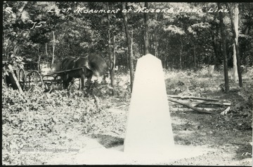Monument marker number 34 at the northernmost point on the boundary line between West Virginia and Maryland. The line T-intersects with the Mason-Dixon line running east to west, dividing West Virginia, Pennsylvania and Maryland.