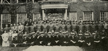 The photograph was published in "West Virginia University and The War"  by J. C. Easton, Professor of History at WVU, shows all classes in medicine in May 1944. A few staff members are included. Military students were trained for specialized service in the armed forces and were prescribed by the Army, although in general they conform closely to the standard specialized courses of the University.