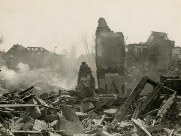 Information on back of picture is torn, but partial info reads: "This is a scene in Zweibrucken, hammered by Allied air and U.S. artillery attacks before Seventh U.S. Army troops captured the town March 20, 1945."