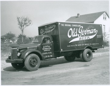 Truck carrying The Original Cumberland Old German Beer "Made Only By The Queen City Brewing Co., Cumberland, Md.." "Beware of imitations."