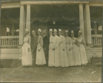 Unidentified medical staff pose in front of the hospital in Marion County.
