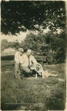 The little boy is Donovan Bond with his Uncle Harley and their dog.  Bond would subsequently graduate from West Virginia University, serve in the Pacific Theater during World War ll and teach at WVU as a Professor of Journalism.