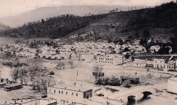 Cass was created as a company town for workers at the West Virginia Pulp and Paper Company, who logged at Cheat Mountain. Logs cut there were brought to town via rail and processed for use by paper and hardwood companies throughout the country. Residents lived with their families atop a hill in 52 white fenced houses build in orderly rows.