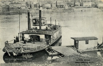 Several people gather on the deck of a ferry departing onto the Ohio River. See original for correspondence. (From postcard collection legacy system.)