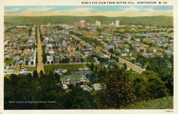 Bird's eye view of Huntington, West Virginia from atop Ritter Hill. Published by I. Ribbons &amp; Son. (From postcard collection legacy system.)