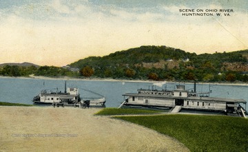 Two boats docked on the Ohio River. (From postcard collection legacy system.)