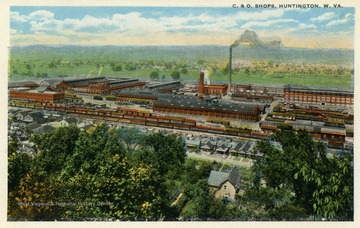 View of shops and homes at C &amp; O Station in Huntington, West Virginia. Published by I. Robbins &amp; Son. (From postcard collection legacy system.)