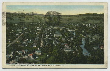 The view includes the state hospital. See original for correspondence. (From postcard collection legacy system.)