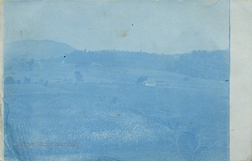 This image was development with cyanide, giving it a blue hue and is known as a cyanotype photograph. See original for correspondence. (From postcard collection legacy system.)