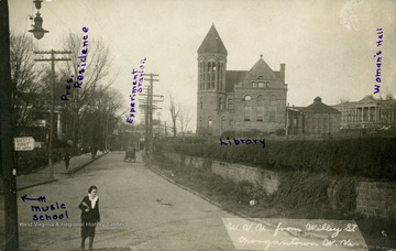 Library is main building in center of picture. Women's Hall is building on far right in distance. University President's residence and music school to the left. Experiment Station further down the road. Published by Robt. L. Shirer. (From postcard collection legacy system.)