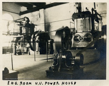 Interior view of machinery at the U.U. Power House. (From postcard collection legacy system.)