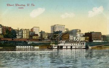 Steam boat is docked on the side of river at wharf. Published by A.C. Bosselman and Company. (From postcard collection legacy system.)