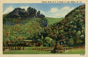 Caption on back of postcard reads: "Seneca Rock, 900 feet high, overlooking old Seneca Indian Trail or Warriors Path, which was the Indian highway from new York to the South in West Virginia." Published by Rex Heck News Company. (From postcard collection legacy system.)