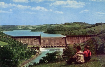 Postcard depicts two children overlooking the Tygart Dam.  Children are (left to right) Richard Ware and James Ware, both residents of Grafton at the time of the photo.Published by Rex Heck News Company. (From postcard collection legacy system.)