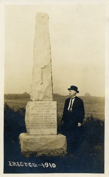 Inscription on monument reads: "In Memory of Sarah Morgan Wife of Elijah Burrows 1767-1791. She Was The Little Girl With Her Brother Stephen, In The Melon Patch, When Her Father David Morgan Had His Famous Fight With Two Indians Near Rivesville, W. Va. April 1, 1773." Monument erected in 1910. (From postcard collection legacy system--subject.)