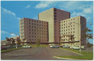 Postcard reads, "This magnificent structure contains more than 3,400 rooms, which includes Basic Science Building and 522-bed Teaching Hospital. Four-year courses of instruction in medicine dentistry, nursing and pharmacy and other health sciences." See original for correspondence. (From postcard collection legacy system--subject.)