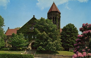 Caption on back of postcard reads: "Built in 1902, this building was formerly the "old" library. It now houses the main administrative offices of the University." Building currently known as Stewart Hall. See original for correspondence. Published by Walter H. Miller and Company Incorporated. (From postcard collection legacy system--WVU.)