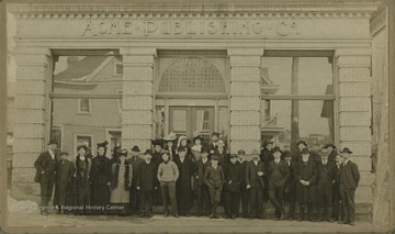 Possibly employees of the Acme Publishing Co. The building was located on High Street.