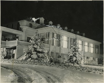 Photo of the country club building after snow fall. 