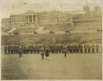 West Virginia University R.O.T.C. students arrange on the lawn in front of what is now know as Stalnaker Hall.