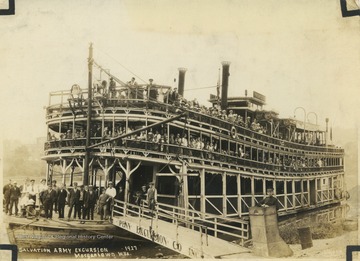 Passengers crowd along the deck of "Princess" before heading off on the Monongahela River. 