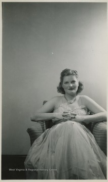Portrait of McGlumphy in what is now known as Stalnaker Hall before the birthday formal of the spring season. 