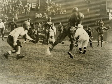 West Virginia University vs. University of Pittsburgh football game. Print number 200.