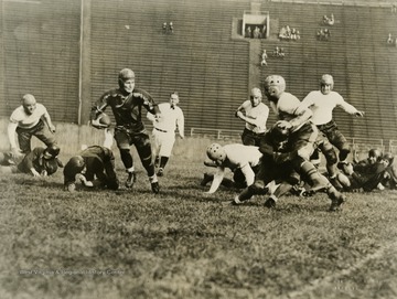 West Virginia University vs. University of Pittsburgh football game. Print number 201.