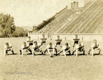 From left to right: Front row: Joe Czajka, Ed Ossoski, Sam Mundich, Pete Antolini, Albert Baisi, and Dick Dolly. Back row: Don McCann, Tony Rapaswick, john Carliss, and Jerry Clark. Print number 205.