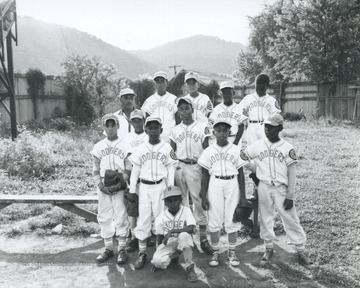 African-American members of the "Dodgers" pose for their team photo. 