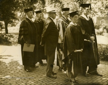 Print number 384. Governor Homer Holt on far left.