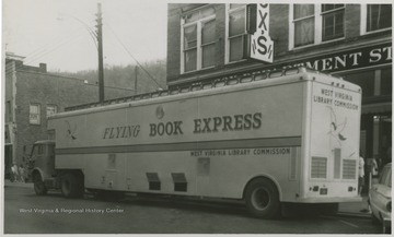 Book Express pictured on Temple Street in front of the A. W. Cox department store.