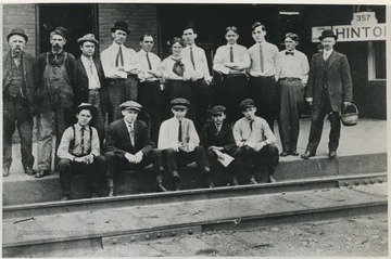 An group of unidentified persons pose on the platform.
