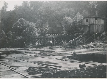 Workers on the mill site. The mill was built in 1878. Subjects unidentified. 