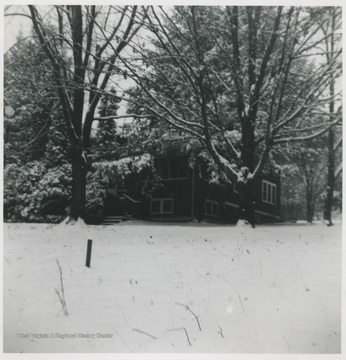 Winter scene of the house from across a snow covered yard near Hinton, W. Va.