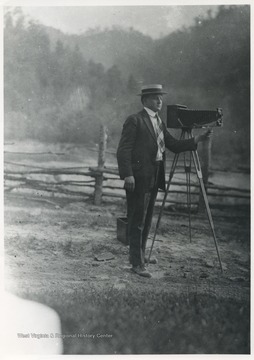 Keller pictured behind a camera. 