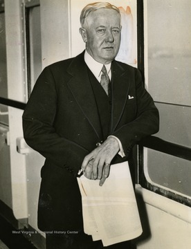 Caption on back of photograph reads: "John W. Davis, well known New York lawyer, and former Presidential candidate on the Democratic ticket. Photographed on the S.S. Europa on his return to Gotham after a vacation trip abroad."
