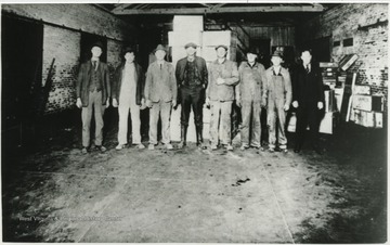 Employees (from left to right) Jim Bob Christian, Wes Surber, Mr. Christian, Ab Wiseman, unidentified, C.O. McGhee, unidentified, and Emmitt McLaughlin. 