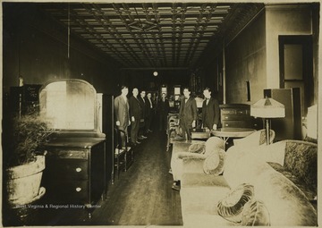 Employees pose inside the store located on Temple Street. Subject unidentified. 